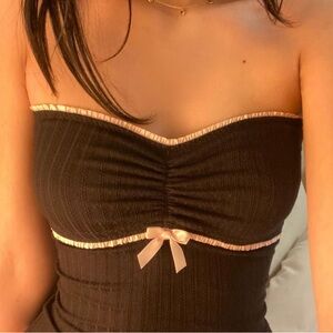 Elegant Black Strapless Top with Pink Accents